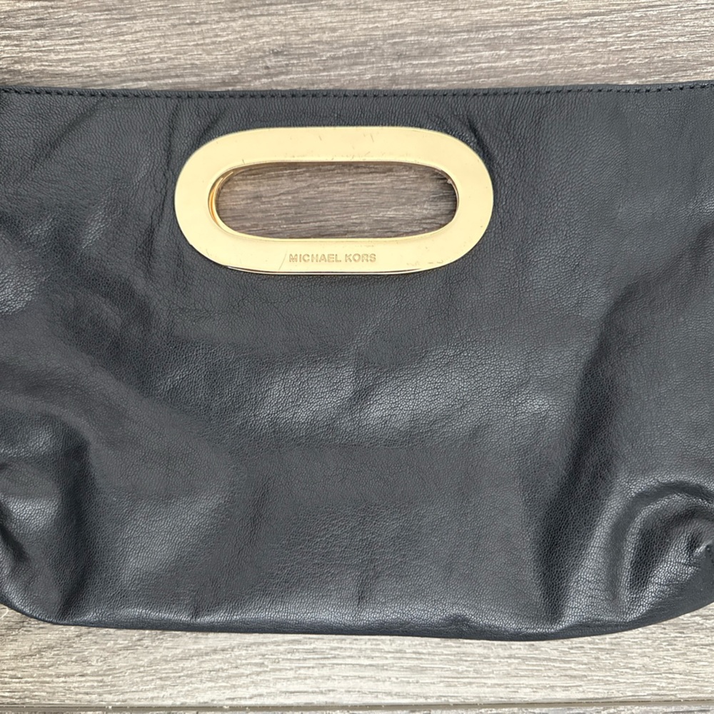 Michael Kors Black and Gold Wristlet with Glossy Finish